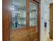 Detailed wooden cabinet with glass doors and drawers at 317 N Arsenal Ave, Indianapolis, IN 46201