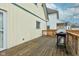 Wooden deck with grill, offering outdoor dining space at 317 N Arsenal Ave, Indianapolis, IN 46201