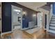 Entryway with hardwood floors and views into living room at 317 N Arsenal Ave, Indianapolis, IN 46201
