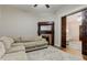 Living room with sectional sofa and fireplace at 317 N Arsenal Ave, Indianapolis, IN 46201