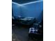 Cozy bedroom with a full-size bed and modern LED accent lights at 3306 N Drexel Ave, Indianapolis, IN 46218