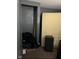 Untidy storage area with a mattress, speaker box, and assorted belongings at 3306 N Drexel Ave, Indianapolis, IN 46218