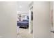 Bedroom view featuring built in shelving, a window and a queen bed at 3933 Byram Ave, Indianapolis, IN 46208