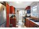 Well-equipped kitchen featuring stainless steel appliances and wood countertops at 3933 Byram Ave, Indianapolis, IN 46208