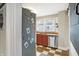 Cozy kitchen featuring stainless steel appliances, tile backsplash, and a window at 3933 Byram Ave, Indianapolis, IN 46208