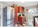 Charming kitchen with wood countertops, stainless steel appliances, and ample cabinet space at 3933 Byram Ave, Indianapolis, IN 46208