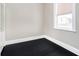 Bright bedroom with a large window and dark wood floors at 602 N Harrison St, Alexandria, IN 46001