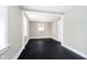 Bedroom showcasing neutral walls, dark floors, and natural light at 602 N Harrison St, Alexandria, IN 46001