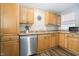 This is a spacious kitchen with wood cabinets and stainless steel appliances at 602 N Harrison St, Alexandria, IN 46001