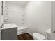Cozy bathroom features a shower and tub combination with modern fixtures at 633 S Grand Ave, Indianapolis, IN 46219