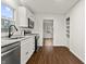 Updated kitchen features stainless steel appliances, granite countertops, and ample cabinet space at 633 S Grand Ave, Indianapolis, IN 46219