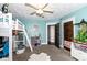 A bedroom featuring a loft bed, shelving, and unique décor at 66 N Ritter Ave, Indianapolis, IN 46219