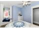 Charming bedroom with a built-in window seat, white dresser, and cozy decor at 66 N Ritter Ave, Indianapolis, IN 46219