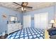 Comfortable main bedroom features dual closets and plenty of natural light at 66 N Ritter Ave, Indianapolis, IN 46219