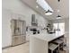 Bright and open kitchen featuring white cabinetry, stainless appliances, and modern design at 8349 Tequista Cir, Indianapolis, IN 46236