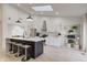 Bright kitchen with white cabinets, stainless steel appliances, and a large island at 8349 Tequista Cir, Indianapolis, IN 46236