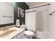 The bathroom showcases a vanity with cream counters, and a decorative painting at 9703 W Stargazer Dr, Pendleton, IN 46064