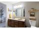 Well-lit bathroom with a double vanity, decorative accents, and modern fixtures at 9703 W Stargazer Dr, Pendleton, IN 46064