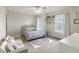 Neutral bedroom with soft textures and natural light, enhanced by a rainbow rug at 9703 W Stargazer Dr, Pendleton, IN 46064