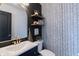 Stylish half bathroom features modern fixtures, a chic mirror, and decorative accents at 9703 W Stargazer Dr, Pendleton, IN 46064