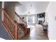 Bright living room with a fireplace and wood-look flooring at 9703 W Stargazer Dr, Pendleton, IN 46064