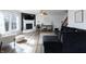 Comfortable living room with fireplace, modern decor, and staircase view at 9703 W Stargazer Dr, Pendleton, IN 46064