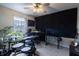 Bright music room with a drum kit, music equipment, and a ceiling fan at 9703 W Stargazer Dr, Pendleton, IN 46064