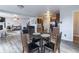 Open floorplan with seamless transitions between the kitchen, living, and dining areas for modern living at 9703 W Stargazer Dr, Pendleton, IN 46064