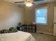 Bedroom with a bed, storage cubes, and a window to let in natural light at 971 Alexander St, Greenwood, IN 46143