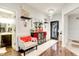 Elegant foyer with hardwood floors, chandelier, decorative mirror, and stylish furnishings at 1006 Cherry Tree Ln, Greenwood, IN 46143