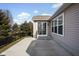 Charming backyard features a concrete patio, and sliding glass doors for easy outdoor enjoyment at 13998 Avalon Blvd, Fishers, IN 46037
