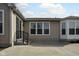 Backyard patio features convenient access to both a sunroom and sliding glass door entrance at 13998 Avalon Blvd, Fishers, IN 46037