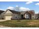 Lovely home with a well-manicured lawn and inviting curb appeal at 13998 Avalon Blvd, Fishers, IN 46037