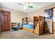 Cozy bedroom featuring carpet, a multi-colored ceiling fan, bunk beds, and a closet at 1563 Old Thicket Ct, Greenwood, IN 46143
