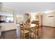 Open-concept living space with a dining area and a staircase leading to the second floor at 1563 Old Thicket Ct, Greenwood, IN 46143