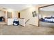 Spacious upstairs hallway with neutral carpet leads to several bedrooms, creating a seamless flow at 1563 Old Thicket Ct, Greenwood, IN 46143