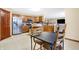 Spacious eat-in kitchen featuring stainless steel appliances and a breakfast table at 1563 Old Thicket Ct, Greenwood, IN 46143