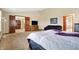 Bright main bedroom with seating and access to other rooms creates a functional and relaxing space at 1563 Old Thicket Ct, Greenwood, IN 46143