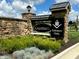 Stone entrance sign with landscaping for Grantham community at 15915 Bellows Dr, Fishers, IN 46040