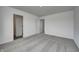 Large bedroom with plush carpeting, neutral paint, and access to ensuite bathroom and walk-in closet at 1934 Black Oak Dr, Shelbyville, IN 46176