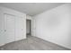 This bedroom features neutral carpet and a closet for storage at 1934 Black Oak Dr, Shelbyville, IN 46176