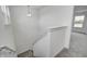 Carpeted staircase leads to the upper level with lots of natural light at 1934 Black Oak Dr, Shelbyville, IN 46176