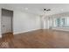 Bright and open living room with hardwood floors, neutral paint, and ample space at 19997 Old Dock Rd, Westfield, IN 46074