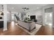 Spacious open-concept living room with stylish sofa, modern decor, and plenty of natural light at 19997 Old Dock Rd, Westfield, IN 46074