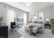 Calm main bedroom with a plush bed, soft lighting, and serene decor at 19997 Old Dock Rd, Westfield, IN 46074