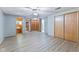 Finished room with gray walls and laminate flooring, natural light, and closet space at 2016 Colt Rd, Indianapolis, IN 46227