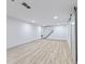 Spacious finished basement with recessed lighting and modern flooring at 218 W 31St St, Indianapolis, IN 46208