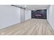 Finished basement with modern electric fireplace and barn door at 218 W 31St St, Indianapolis, IN 46208