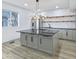 Stylish kitchen boasts stainless steel appliances and a large center island at 218 W 31St St, Indianapolis, IN 46208