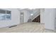 Open-concept living room with staircase and contemporary design elements at 218 W 31St St, Indianapolis, IN 46208